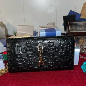 Gucci vintage embossed Leather large wallet excellent condition!!!